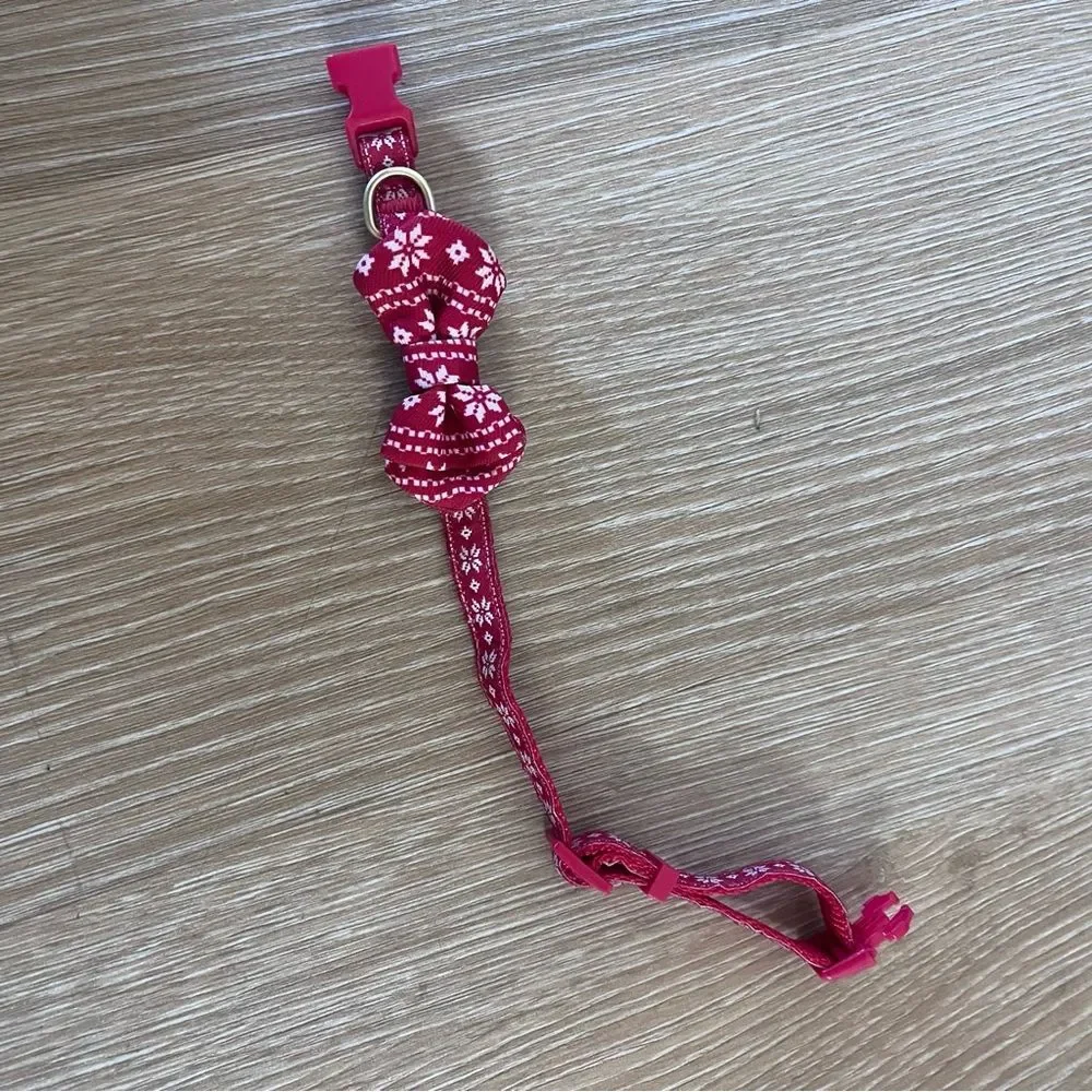 Festive red and white holiday dog collar with bow tie